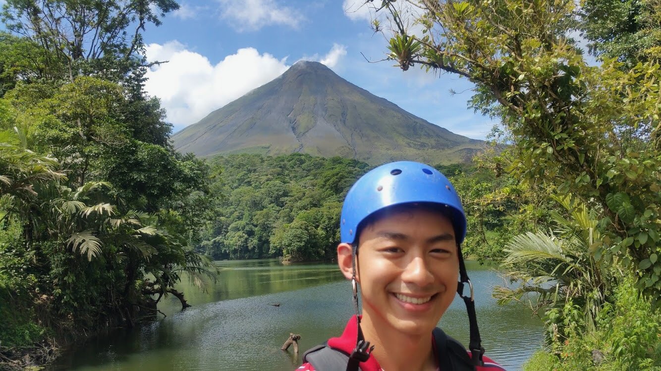 Me standing in front of <em>Volcán Arenal</em> in August 2018.
